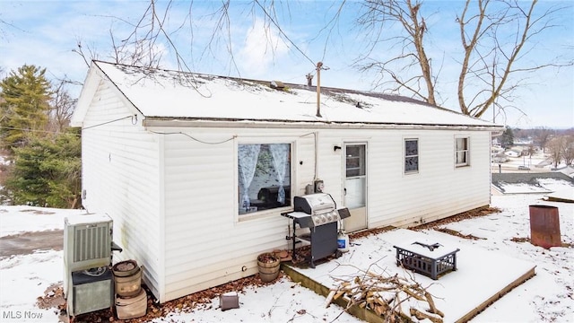 view of snow covered house