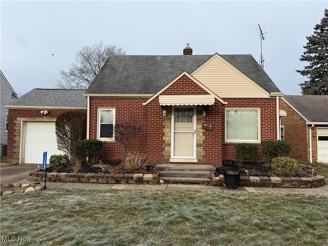 view of front of property with a garage, a chimney, a front lawn, and brick siding