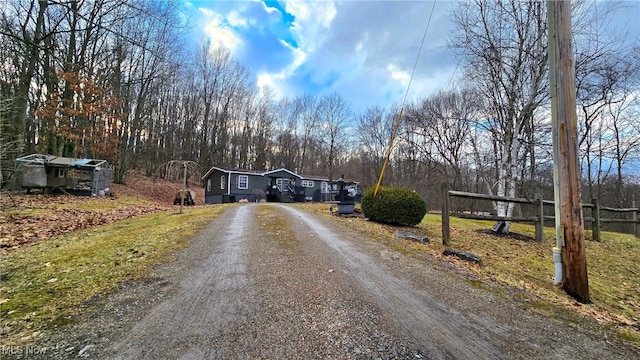 view of street featuring driveway