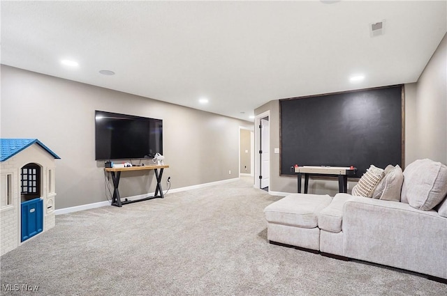 living room featuring recessed lighting, light carpet, visible vents, and baseboards