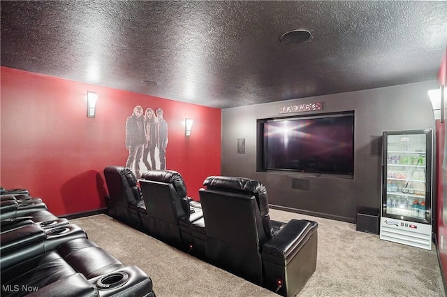 home theater with baseboards, a textured ceiling, and light colored carpet