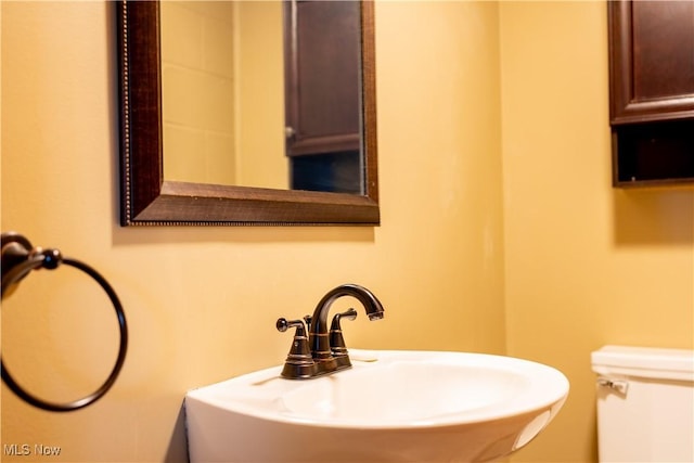 bathroom with a sink and toilet