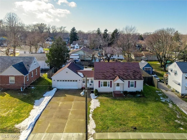 birds eye view of property with a residential view