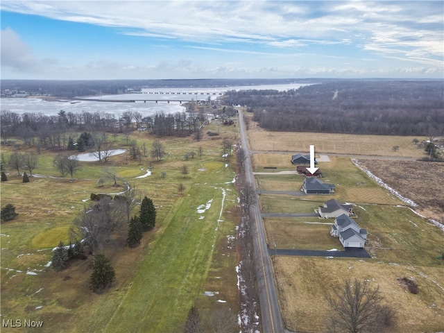 drone / aerial view with a rural view and a water view