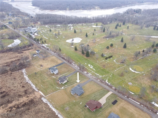 aerial view featuring a rural view and a water view