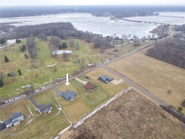 drone / aerial view with a water view and a rural view