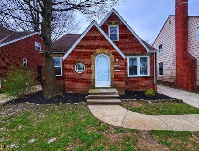 view of front of home with brick siding