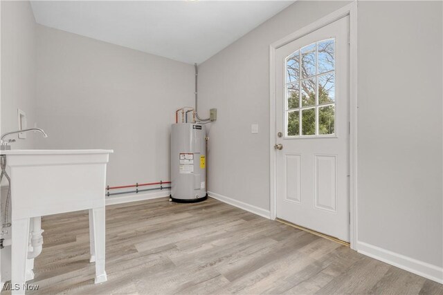 1893 Benjamin Rd, Madison, OH 44057 - utility room featuring water heater
