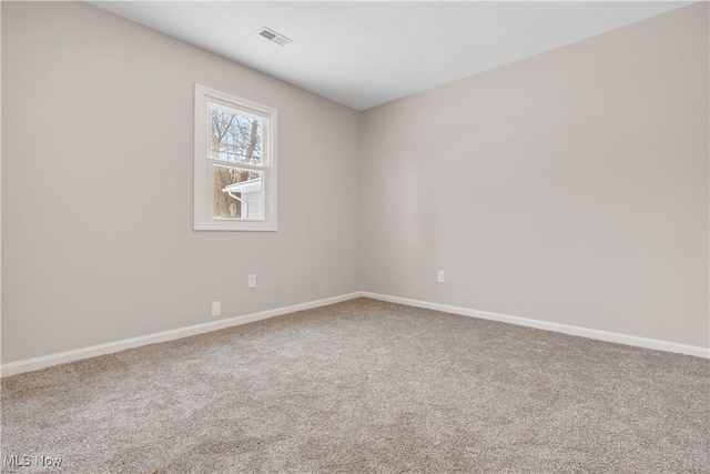 1893 Benjamin Rd, Madison, OH 44057 - empty room with carpet flooring and baseboards