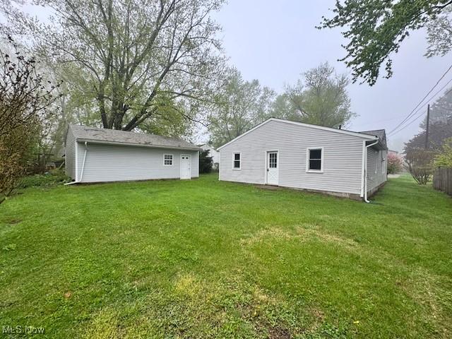 1893 Benjamin Rd, Madison, OH 44057 - back of property with a lawn