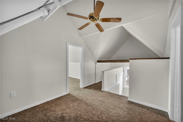 additional living space with lofted ceiling, carpet, and baseboards