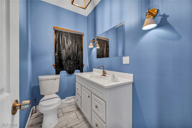 bathroom with visible vents, baseboards, toilet, marble finish floor, and vanity