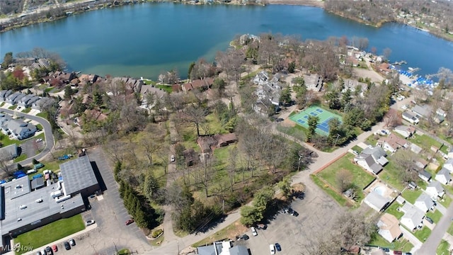 birds eye view of property featuring a water view and a residential view