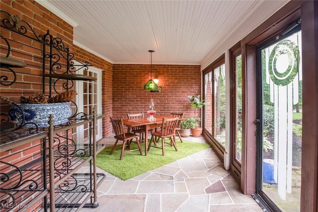 sunroom featuring wood ceiling