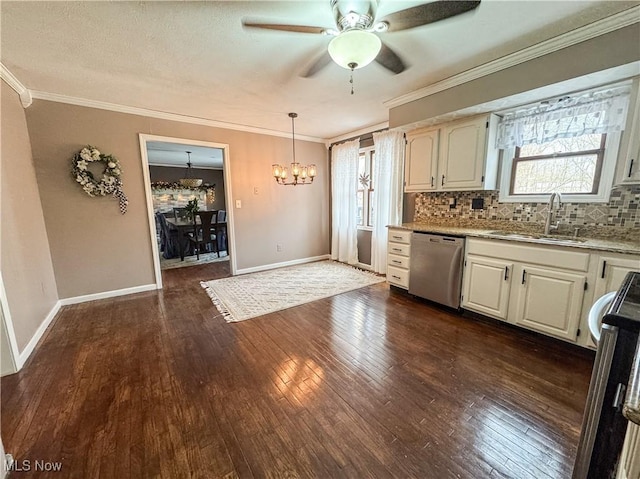 kitchen with dishwasher, ornamental molding, a sink, and backsplash