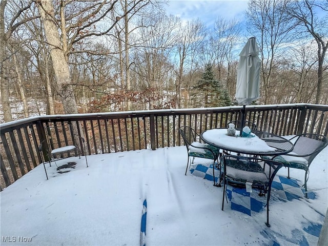 view of snow covered deck