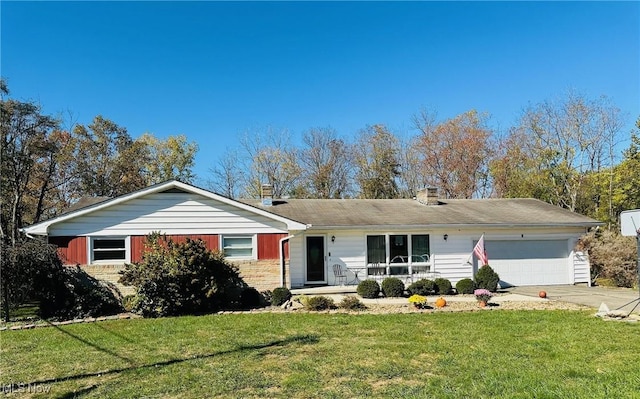 ranch-style house with a garage, driveway, a chimney, and a front yard