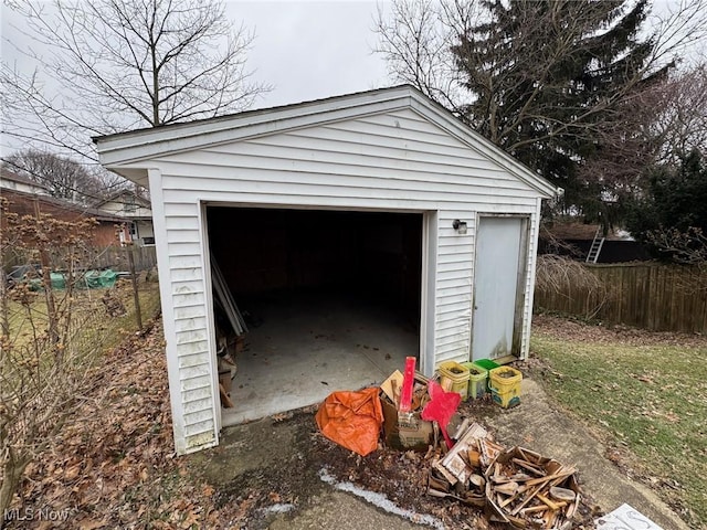 garage featuring fence