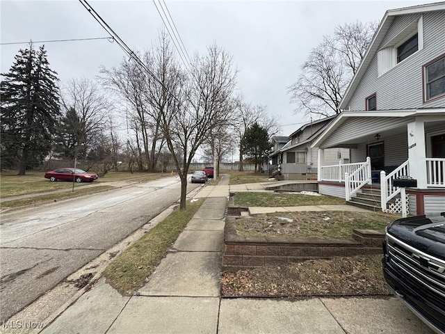 view of road featuring curbs and sidewalks