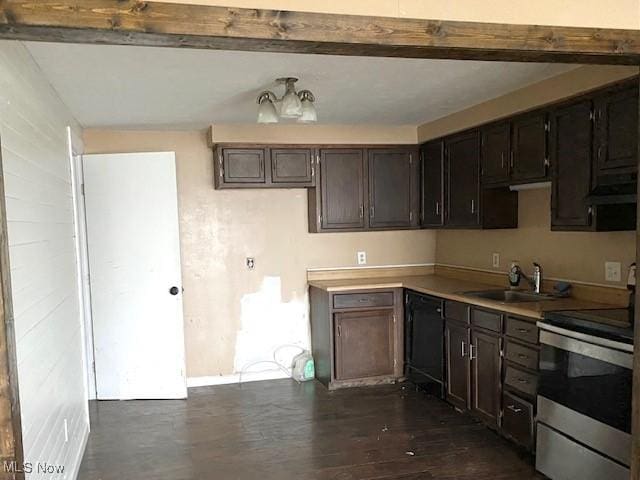 kitchen with light countertops, beamed ceiling, a sink, and stainless steel range with electric stovetop