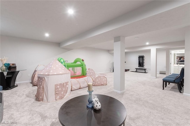 recreation room featuring baseboards, carpet floors, and recessed lighting