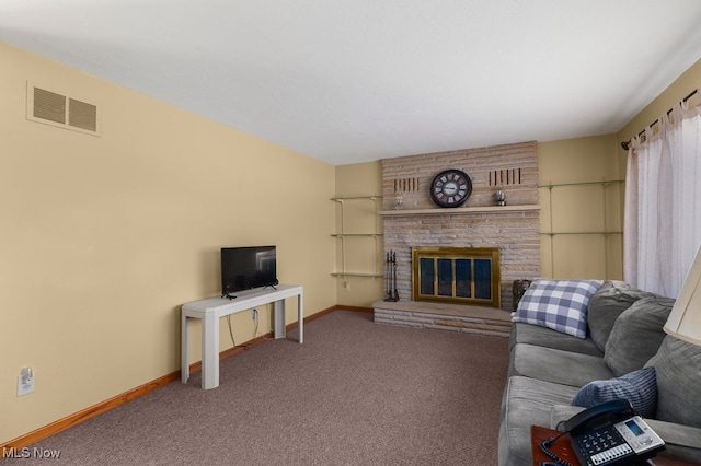 carpeted living area with visible vents, a fireplace, and baseboards