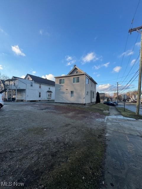 view of home's exterior with a residential view