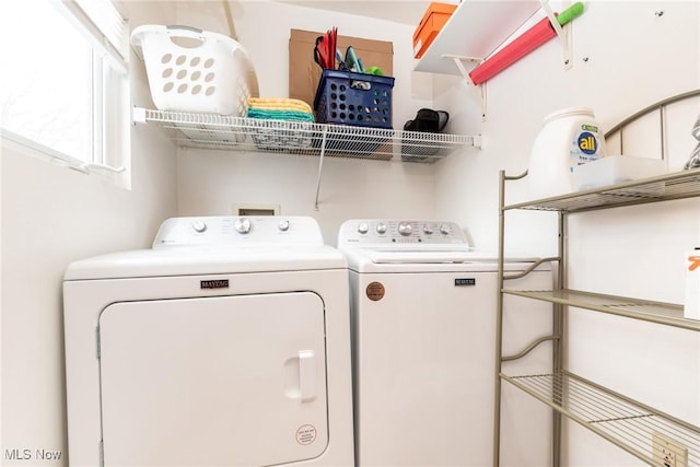 washroom with laundry area and separate washer and dryer