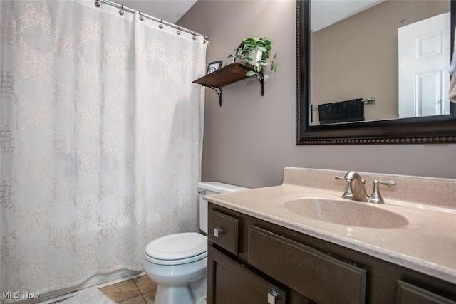 full bathroom with toilet, a shower with curtain, tile patterned flooring, and vanity