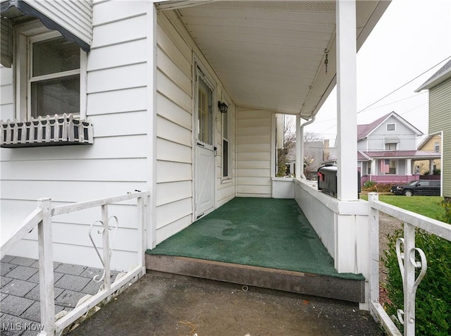 exterior space featuring covered porch