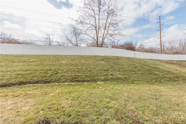 view of yard featuring fence