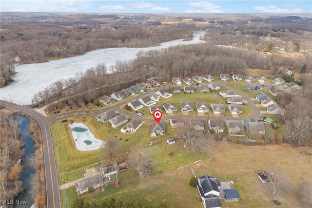 birds eye view of property featuring a water view and a residential view