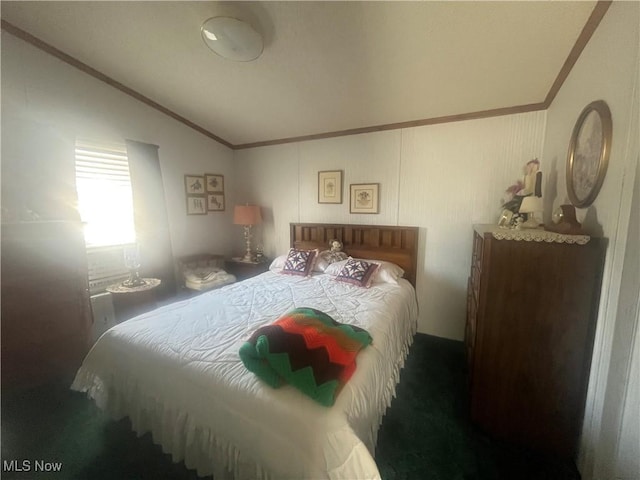 bedroom with crown molding and vaulted ceiling