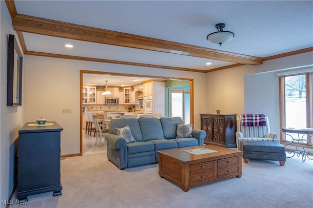 living area with recessed lighting, light colored carpet, baseboards, beam ceiling, and crown molding