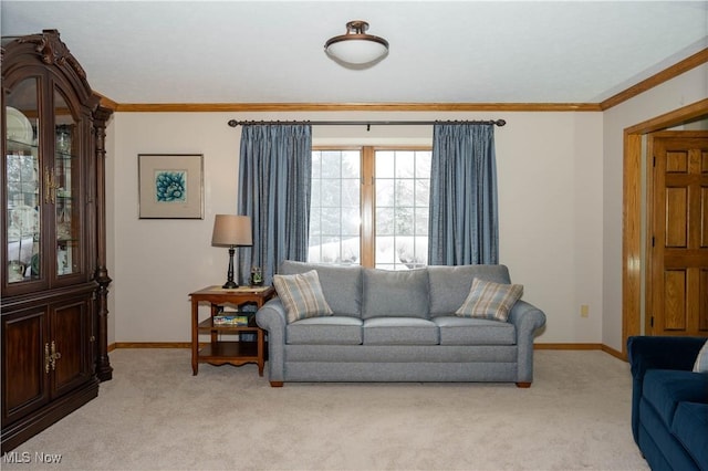 living area featuring light carpet, crown molding, and baseboards