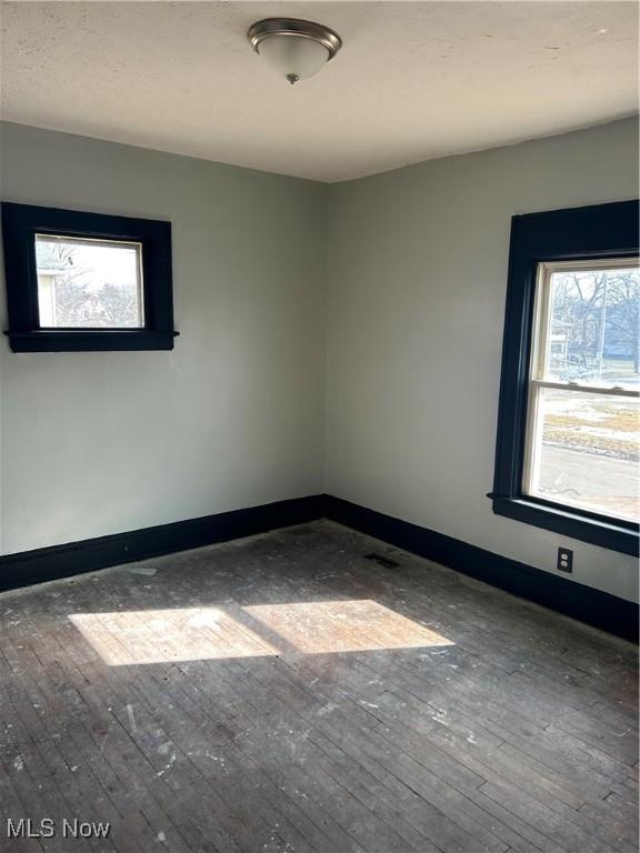 11617 Ely, Cleveland, OH 44120 - unfurnished room featuring hardwood / wood-style floors and baseboards