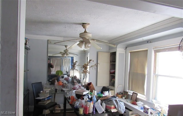 dining area with a textured ceiling