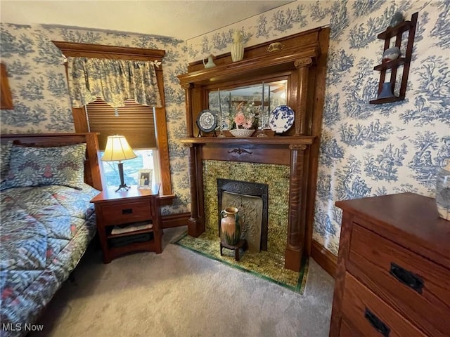 601 W 3rd St, Williamstown, WV 26187 - carpeted bedroom with wallpapered walls and a tile fireplace