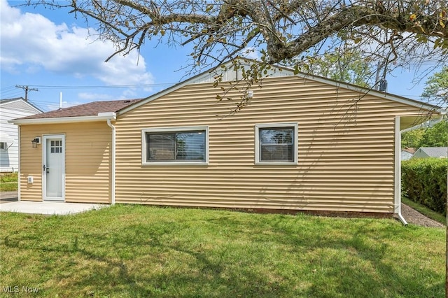 exterior space with a yard and a patio