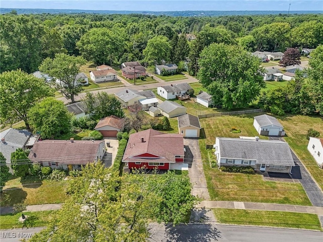 aerial view with a residential view and a wooded view