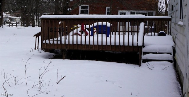 view of snow covered deck