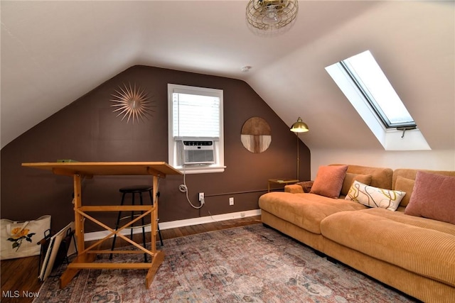 bonus room featuring lofted ceiling with skylight, baseboards, cooling unit, and dark wood-style flooring