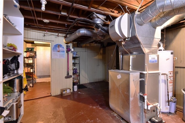 unfinished basement with heating unit and gas water heater