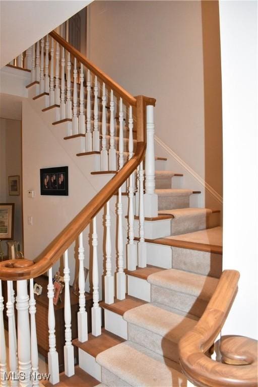 stairway with a high ceiling
