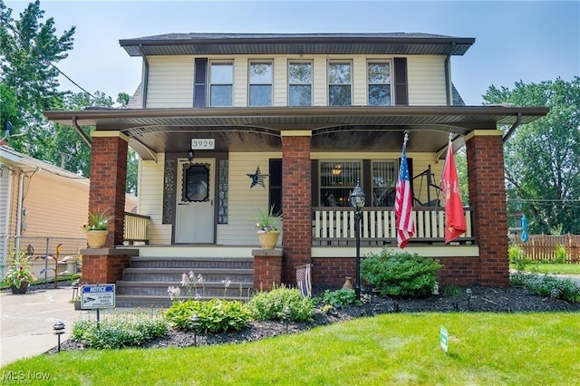 view of front of home featuring covered porch