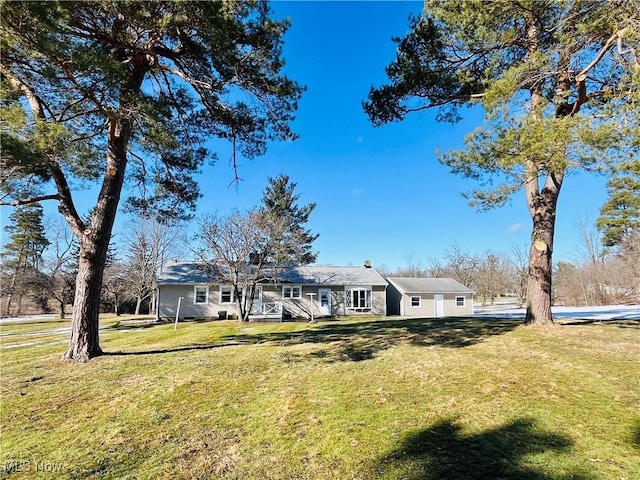 exterior space featuring a front yard