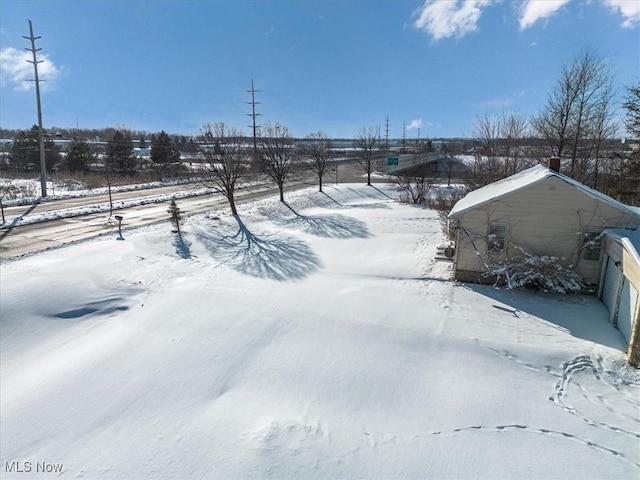 view of snowy yard