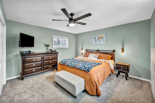 bedroom featuring carpet, ceiling fan, and baseboards