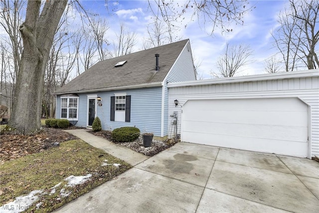 view of front of house featuring an attached garage, concrete driveway, and roof with shingles