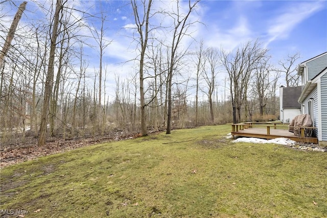 view of yard featuring a deck